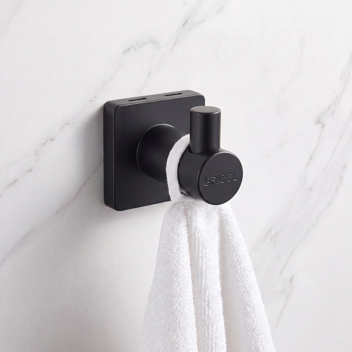 Gancho perchero para baño génesis negro mate ref. 01-5401-07 instalado en pared 