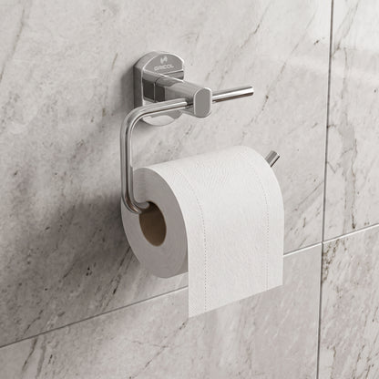 Portarrollo metálico Portobello para baño GRICOL en acabado cromado instalado en la pared de un baño, con papel higiénico.