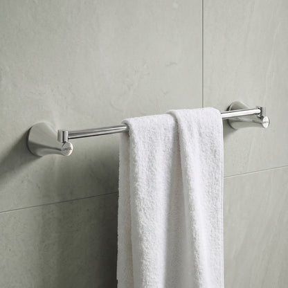 Toallero de barra Contempra cromado Gricol en baño moderno con toalla blanca.
